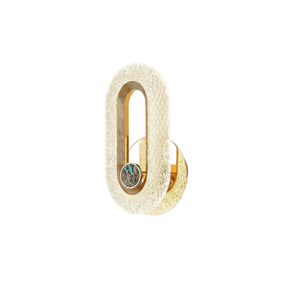 Applique murale ovale doree avec effet cristal lumineux.