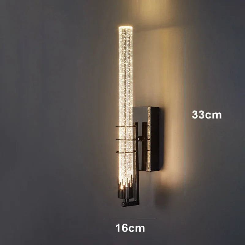 Applique lumineuse doree a effet cristal pour ambiance chaleureuse.
