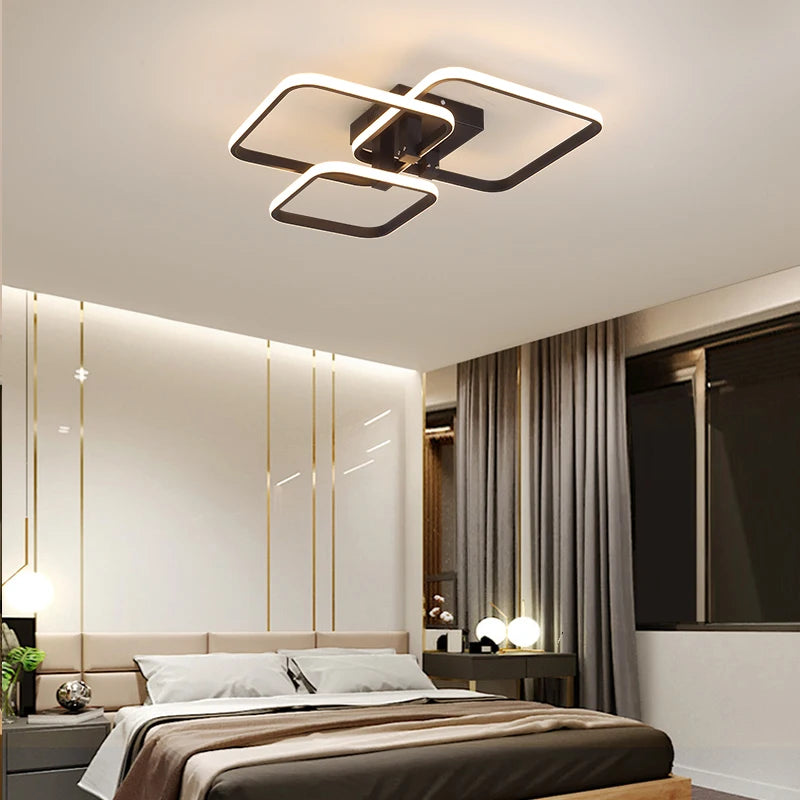 Plafonnier design aux lignes lumineuses entrelacees.