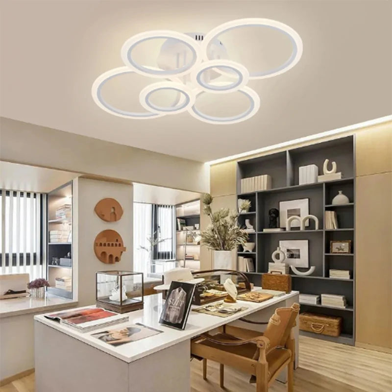 Plafonnier LED blanc forme geometrique en cercles.