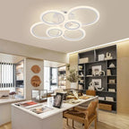 Plafonnier LED blanc forme geometrique en cercles.