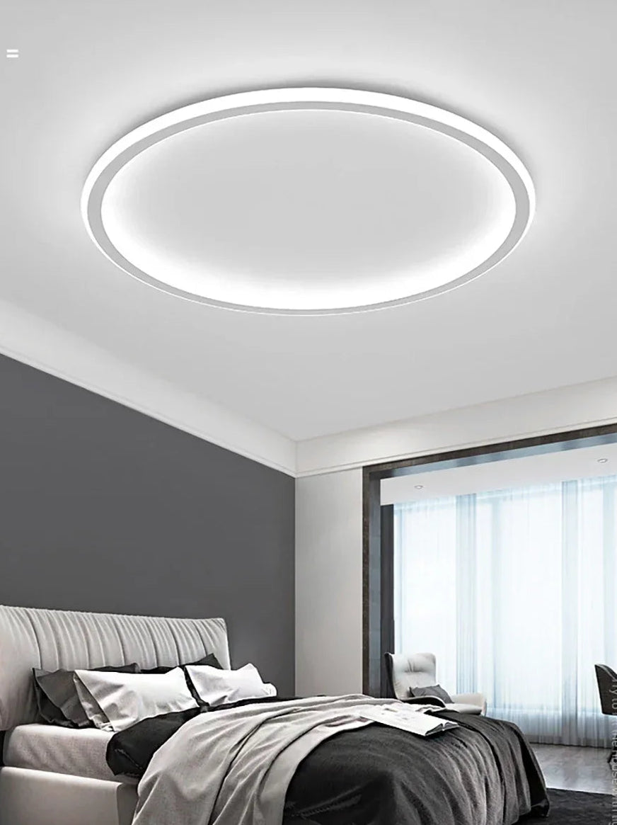 Luminaire rond LED dimmable pour chambre moderne.