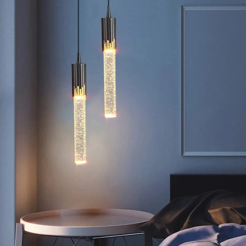 Suspension minimaliste en cristal éclairée par LED pour décoration moderne.