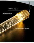 Suspension nordique en cristal produisant une lumière chaude et douce.