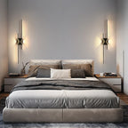 Applique murale LED noire au design moderne vue de face.