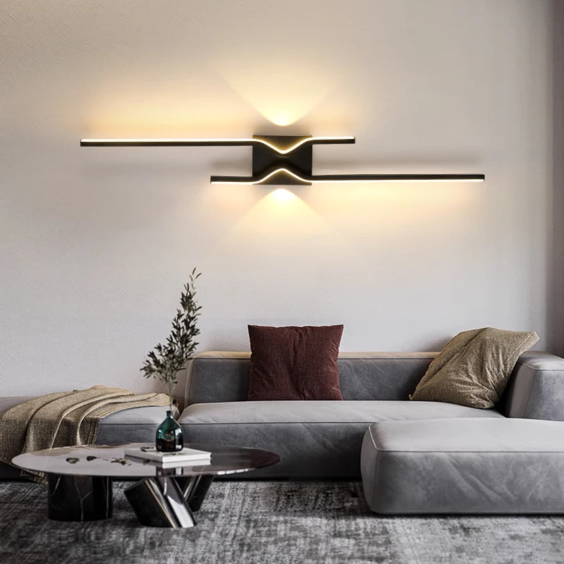 Effet lumineux haut et bas d’une applique LED noire moderne.