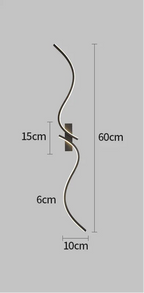 Applique murale LED moderne dotée d’une forme ondulée longue et d’un éclairage mural doux. 