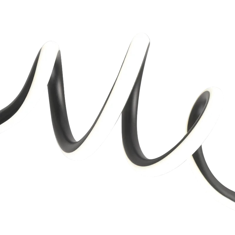 Détail de la lumière LED d’une suspension ondulée moderne.